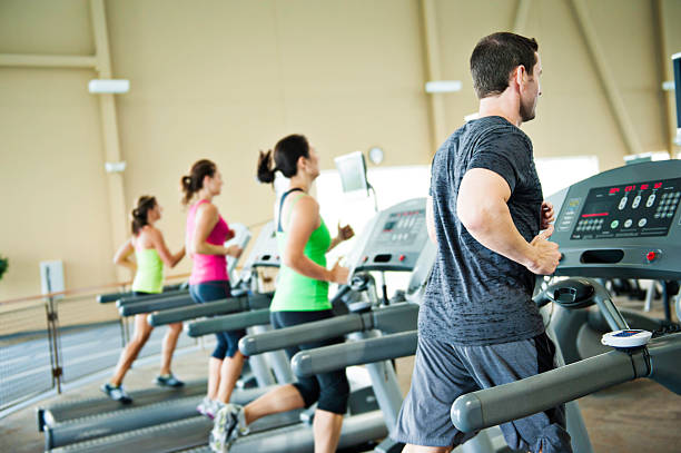 istock Runners on Treadmills in a Healthclub 175434088