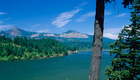 Columbia River Gorge in Oregon is a canyon of the Columbia River in the Pacific Northwest.  Up to 4,000 feet deep, the canyon stretches for over eight miles as the river winds westward through the Cascade Range, forming the boundary between the state of Washington to the north and Oregon to the south.