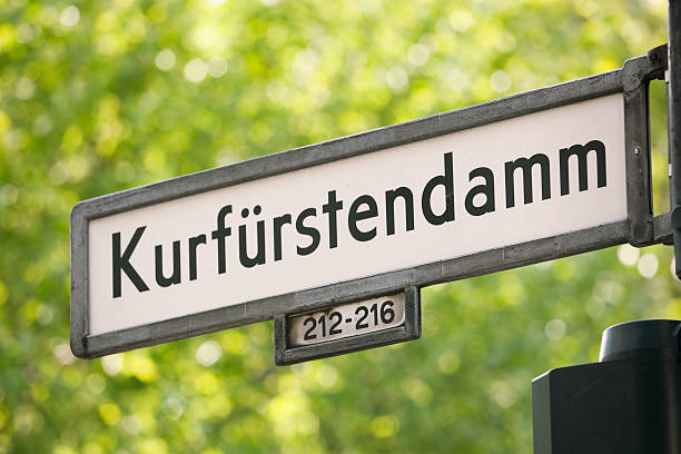 Kurfürstendamm street "KurfArstendamm street sign. KurfArstendamm is one of the most famous avenues in Berlin, the long boulevard is full of shops, houses, hotels and restaurants." street name sign stock pictures, royalty-free photos & images