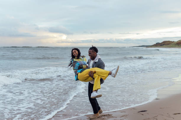 istock Couple Having Fun at the Beach 1754347694