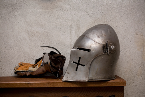 Knight's Helmet and glove on the shelf