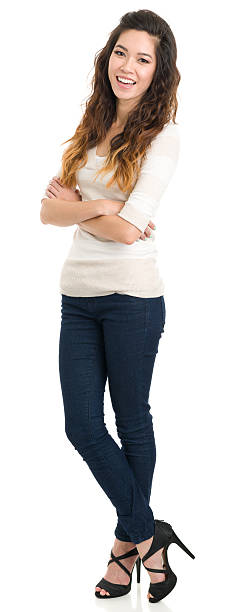 istock Laughing Young Woman Standing With Legs Crossed 175435090