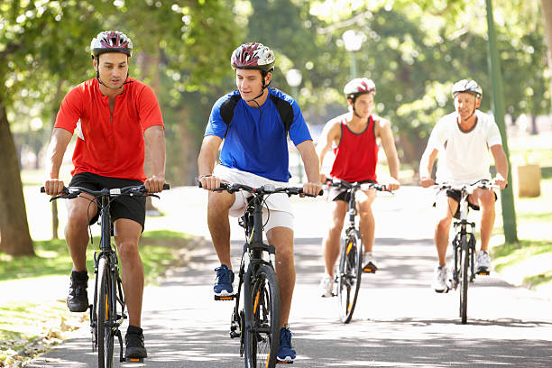 istock Group Of Men On Cycle Ride Through Park 175435237