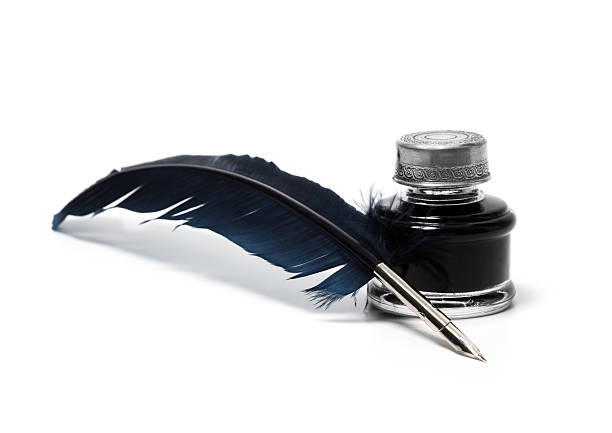 Quill pen and inkwell Quill pen and inkwell isolated on white. ink well stock pictures, royalty-free photos & images