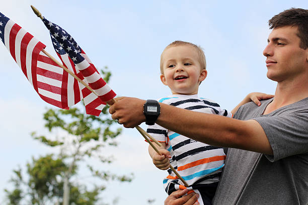 istock Patriotic father and son 175435411