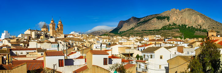 Panoramic view of an Andalusian village with its white houses and tall church towers, Velez Rubio, Andalusia