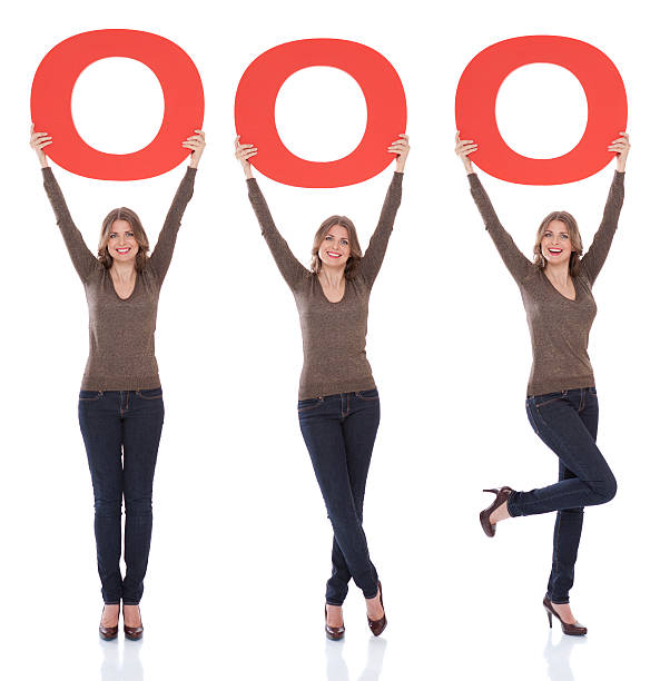 istock Woman holding letter O. 175435485
