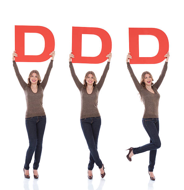 istock Woman holding letter D. 175435597