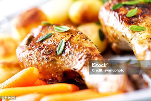 Roast Chicken With Mixed Vegetables Stock Photo - Download Image Now - Animal Body Part, Animal Leg, Animal Limb