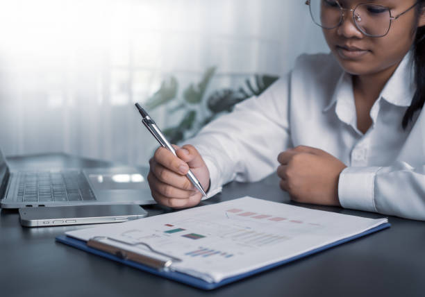istock Business people use computers to analyze business and manage corporate data, business analytics with charts, metrics and KPIs to improve organizational performance, marketing, financial organization strategy. 1754365663