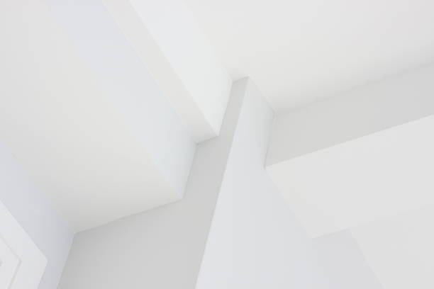 Wall Ceiling Corner Architecture Decor "Walls, ceilings and moulding converge in corners and angles of plasterboard home decor to create an interesting abstract softly illuminated by natural light." nook architecture photos stock pictures, royalty-free photos & images