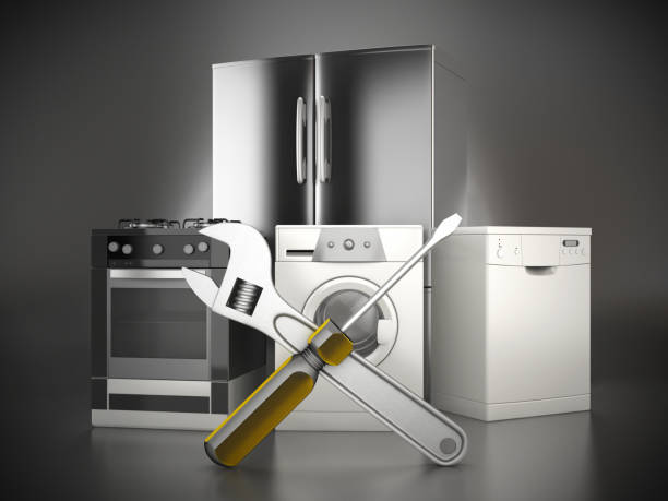 Home appliance repair "Refrigerator, electric oven, washing machine and dishwasher with screwdriver and wrench standing on dark reflective surface.Similar:" freezer photos stock pictures, royalty-free photos & images