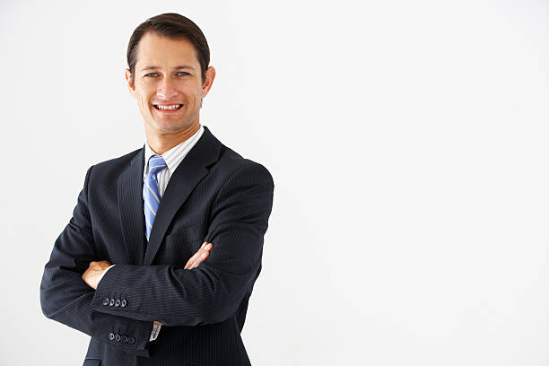 istock Studio Portrait Of Businessman Standing Against White Background 175437294