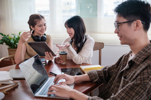 istock Young and diverse group of students studying and talking together in the campus. 1754374990