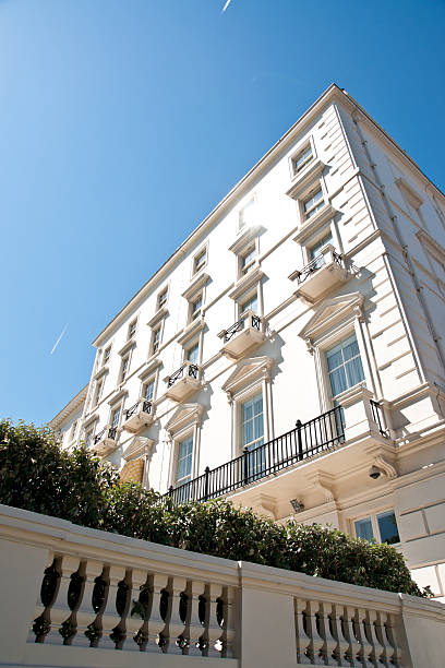 istock london architecture: classic white buildings in warm sunny summer day 175437737