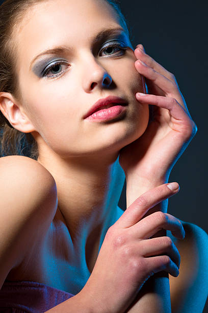 istock Young Women face on gray 175437851