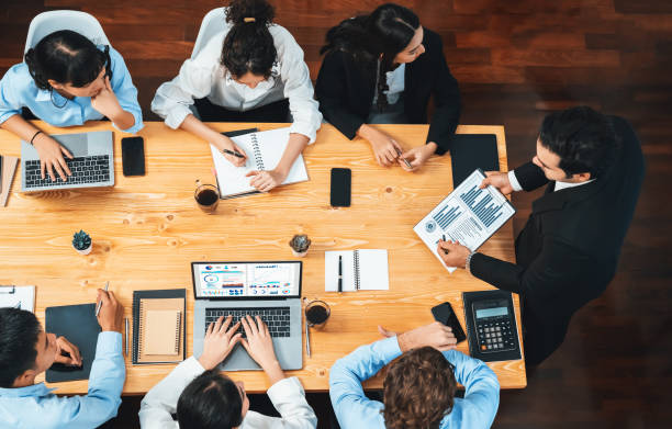 istock Panorama top view diverse analyst team analyzing financial data. Habiliment 1754385923