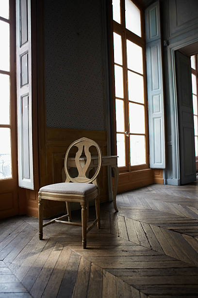 Beautiful old interior of Parisian stately building with high ceilings and large windows