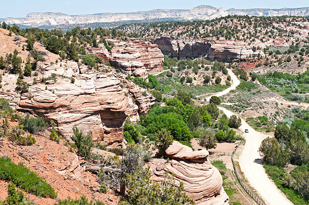 istock Car on dirt road in Utah canyon 175438933
