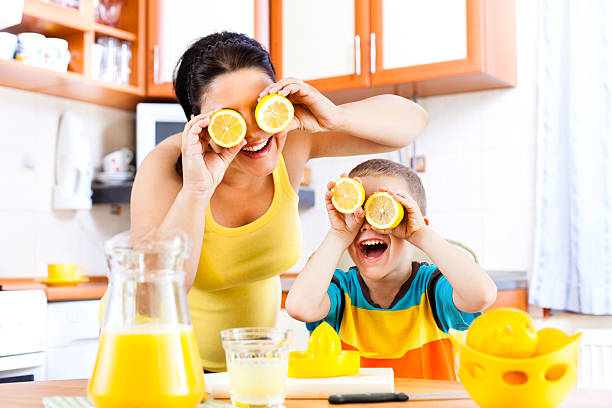istock Series: Mother and child making lemonade 175439196