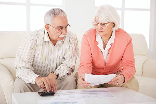 istock Senior couple with bills. 175439293