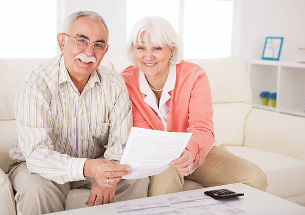 istock Senior couple with bills. 175439299