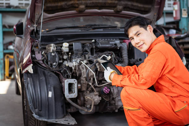 istock Technician trying to jump starting a vehicle. 1754394513