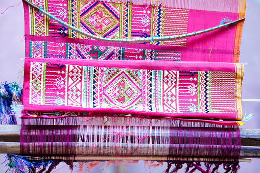 Close-up of Folded traditional thai loomed fabric and textile in village in Phitsanulok province, area Parangmee