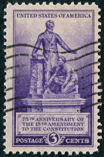 Cancelled Stamp From The United States Featuring Abraham Lincoln Emancipating The Slaves