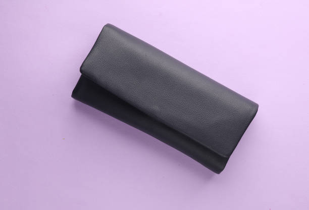 istock Leather fashion wallet on a lavender background 1754398915