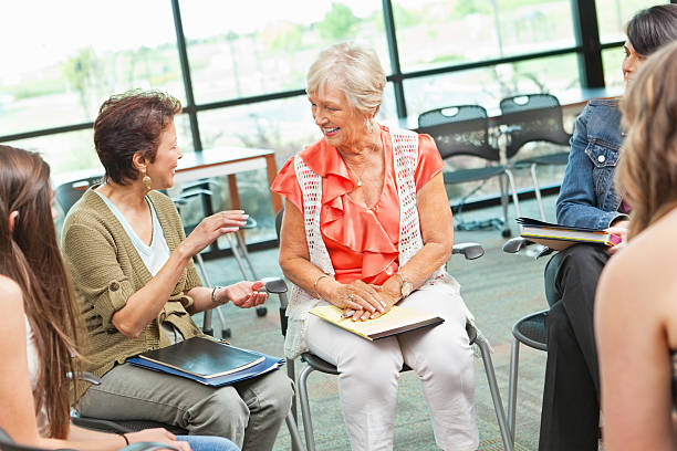 istock Adult woman explaining something to group 175440559