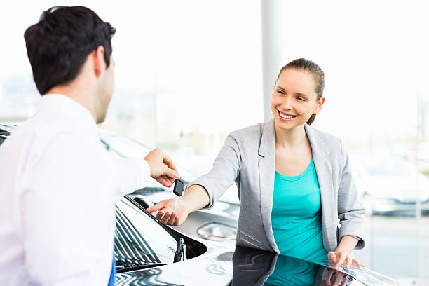 istock Young Woman Buying Car 175440561