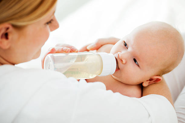 istock Mother feeding newborn baby. 175441243
