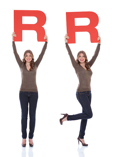 istock Woman holding letter R. 175441839