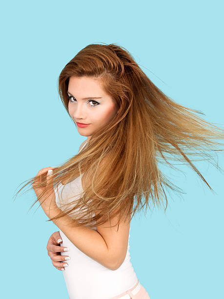istock Woman's hair blowing in wind 175442353