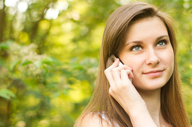 istock Beautiful woman talking on the mobile phone 175442376