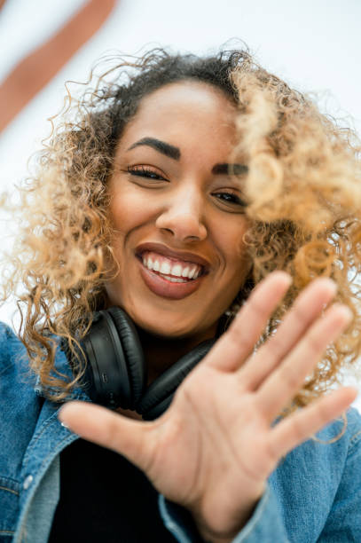 istock Cheerful ethnic woman with camera 1754426397