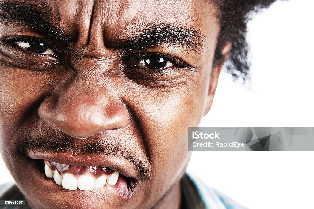 Close-up de angry frustrado jovem fazendo careta - Foto de stock de 20 Anos royalty-free