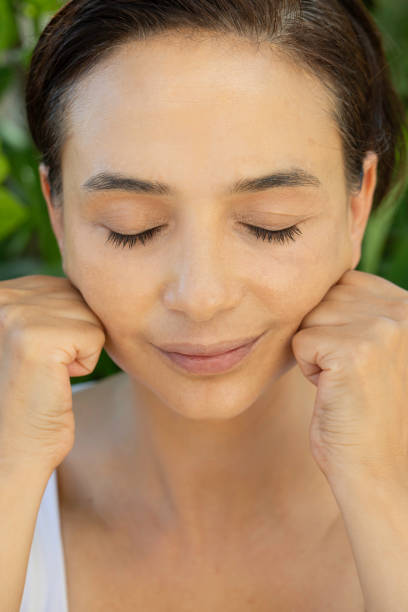 istock Woman Doing Face Yoga 1754436877