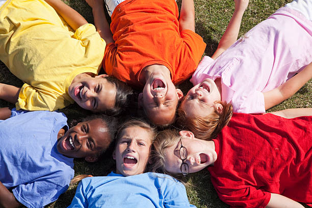 istock Girls lying in a circle looking up 175443720