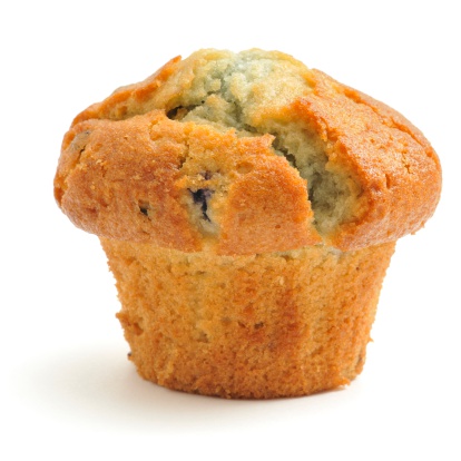 A blueberry muffin isolated on a white background.