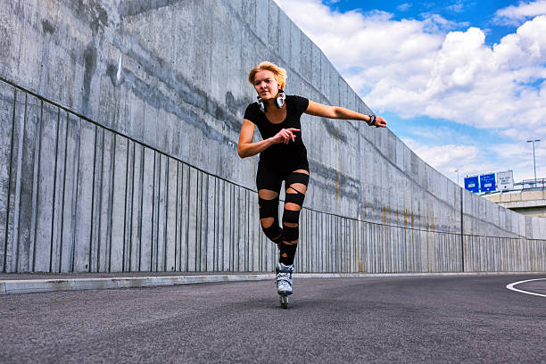 istock Young adult roller skating on the streets 175443980