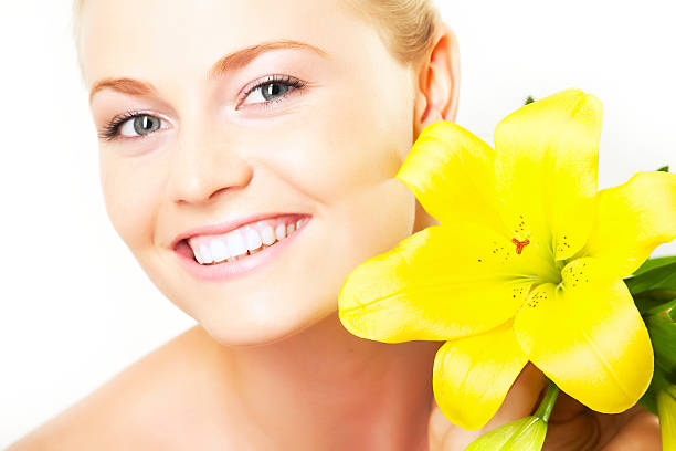 Beautiful brunet woman portrait and flowers