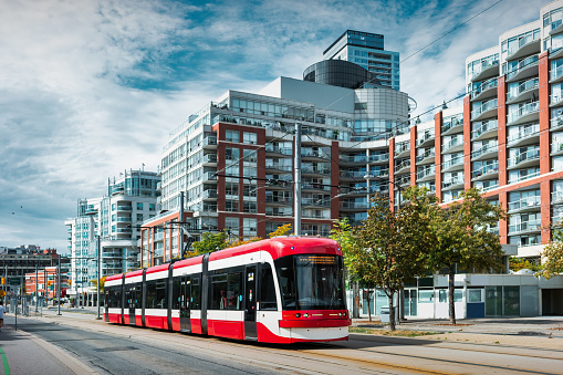 Bus driving on city street, motion blur, panning