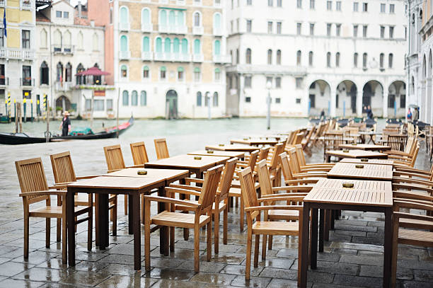 istock Venice Grand Canal cafe in rain 175444820