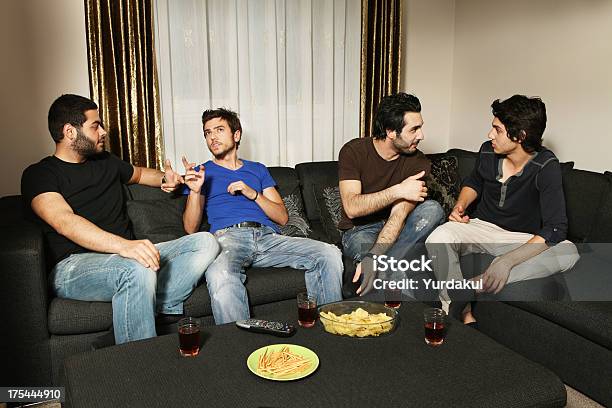 Young Men Having A Nice Evening Stock Photo - Download Image Now - Adult, Arguing, Beard