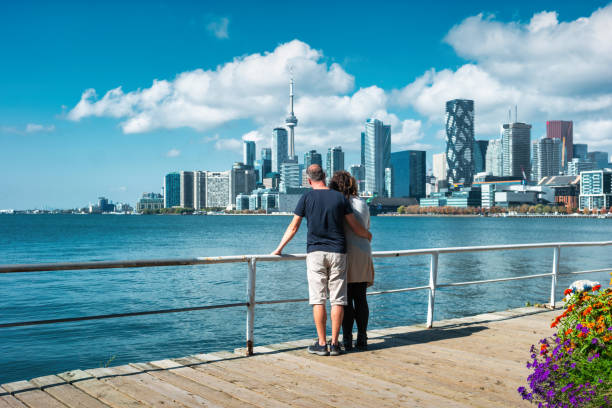 istock Couple Enjoying View Toronto Skyline 1754450412
