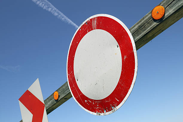 istock German traffic sign against clear blue sky - Road closed 175445211