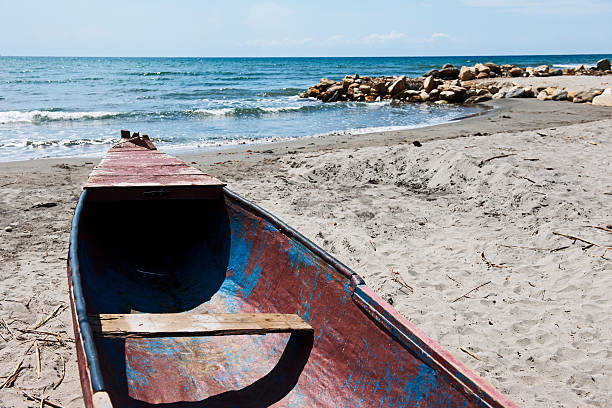 istock Old boat at caribbean beachside 175445382