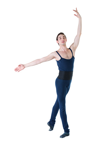 Young ballet man standing in classic ballet pose